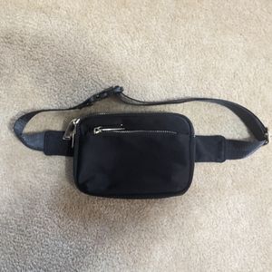 Black fanny pack with gold detail